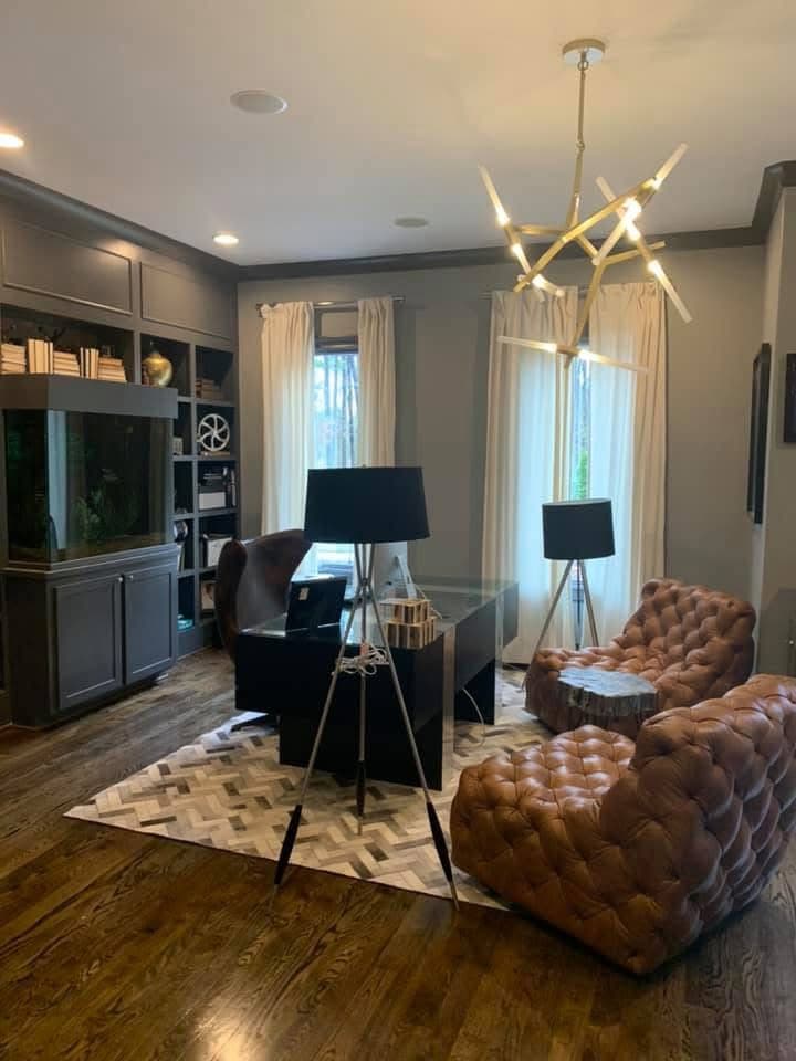 Finished living room with painted walls, ceiling detail and clean trim